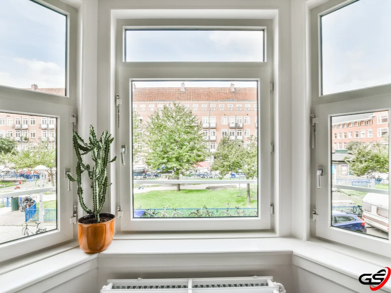 triple pane windows in a modern home overlooking a university campus. 