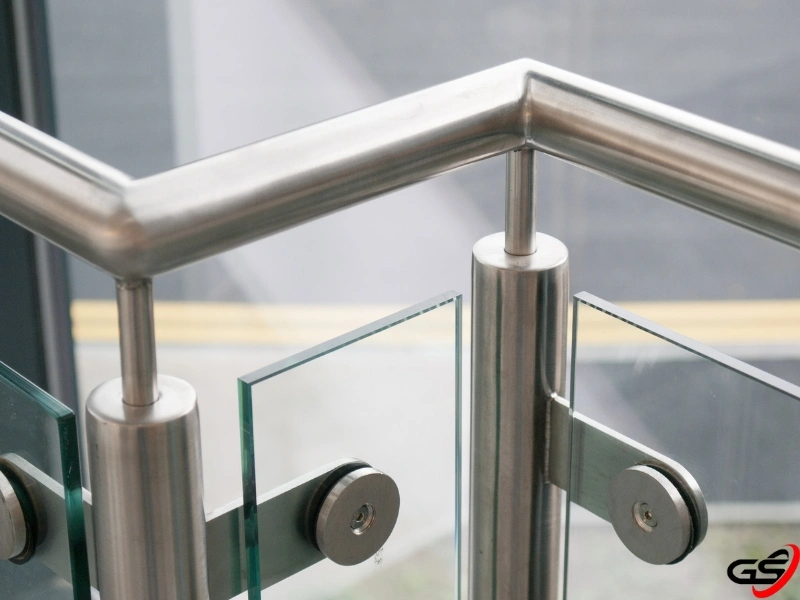 a close-up image of glass railing