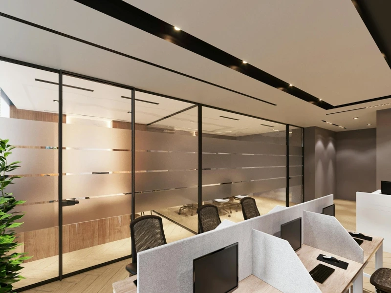 interior glass walls in an office, highlighting commercial glass company, Glass Solutions, who does commercial glass repairs and installations.