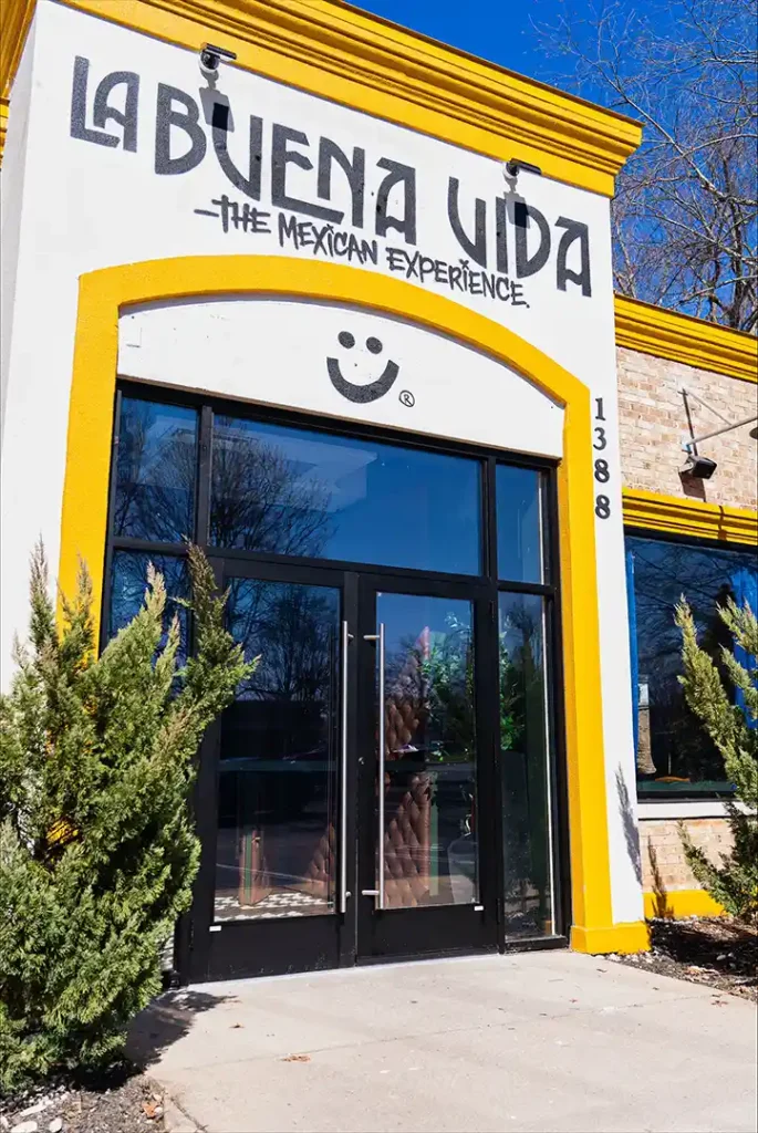 A new glass storefront door, highlighting glass storefront door repair and installation in Raleigh.