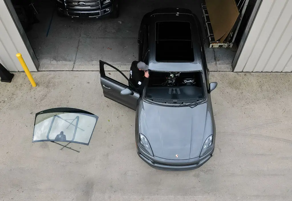 Ariel photo of a man providing windshield replacement in Raleigh, NC.
